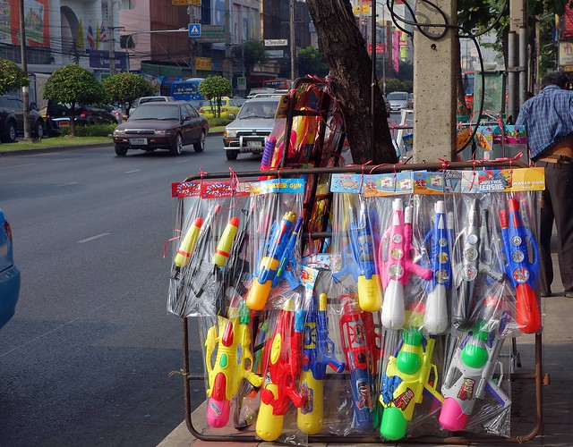 water guns for sale  on the sidewalk during better times