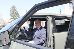 Rep. Ackert learns about the Rivian R1T during Electric Vehicle Day at the Capitol.