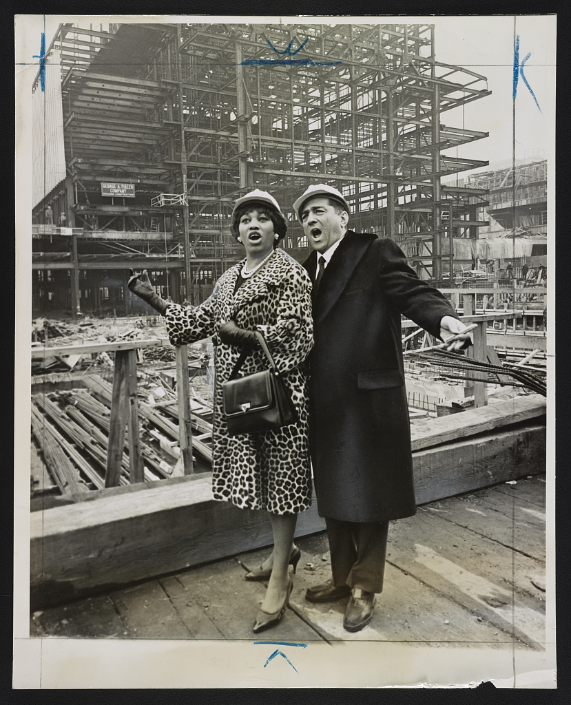 Opera stars Leontyne Price and Robert Merrill deliver an aria at topping-out ceremonies for the new Metropolitan Opera House at Lincoln Center (LOC)