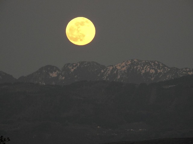 full moon rising in the French Alps France