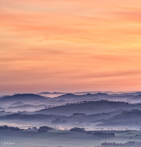 misty morning by neu.j, Uprising sun over the hills and the forrest from Neuenrade, Germany. Taken from the Quitmannstower. 