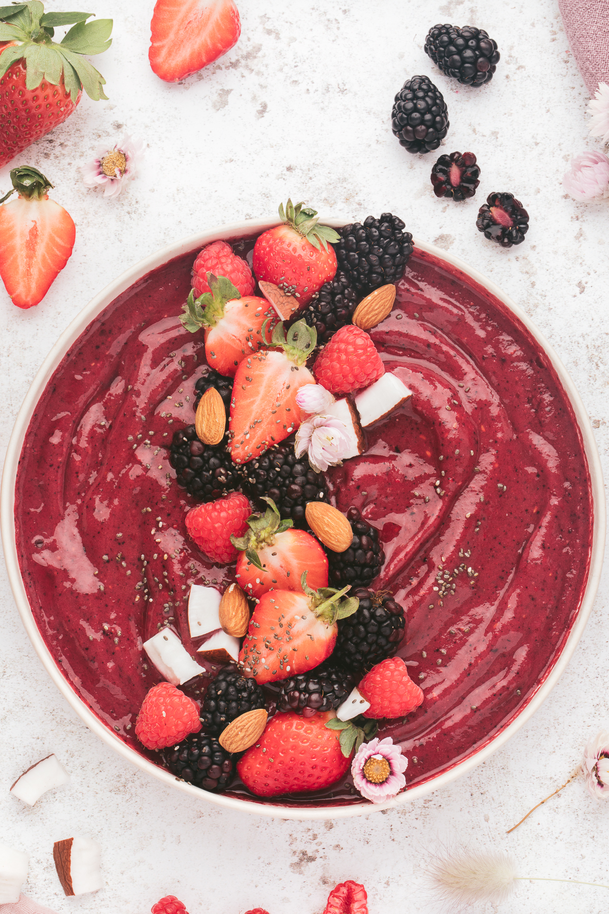 Berry Smoothie Bowl is a delicious and nutritious way to start your day. It's creamy, refreshing, and you can add whatever toppings you like!  