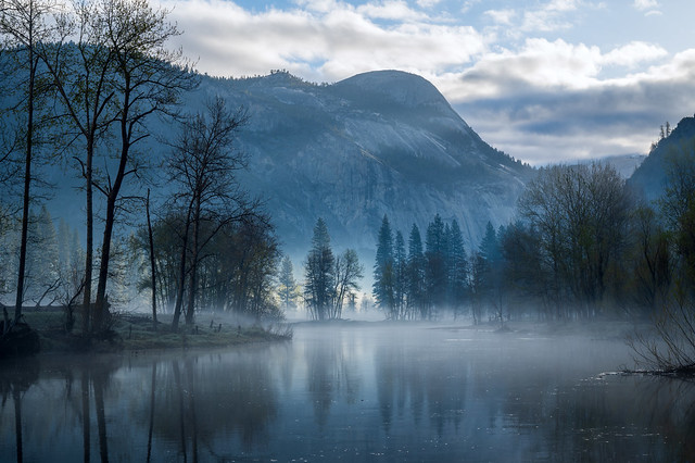 Early morning valley fog. North Dome, Merced River. Yosemite National Park, CA.