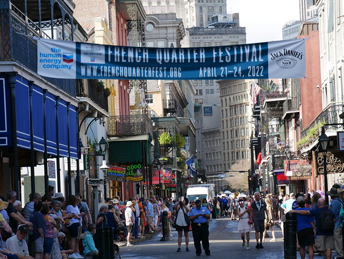 French Quarter Fest sign over Bourbon Street Day 1 - April 21, 2022. Photo by Louis Crispino.