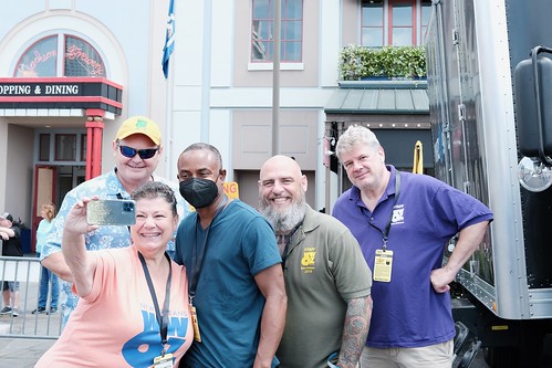 Louis Dudoussat, Beth Arroyo Utterback (selfie in progress), Damond Jacob, Murf Reeves, and Dave Ankers at French Quarter Fest 2022. Photo by Michele Goldfarb.