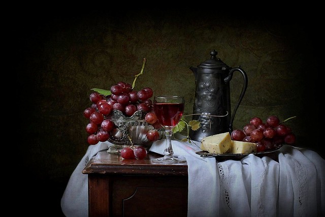 Still life with grapes and cheese