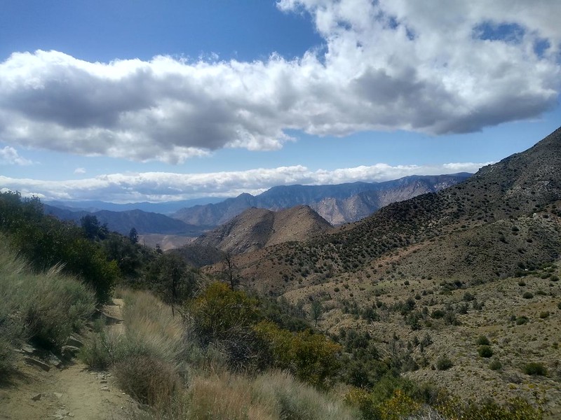 View west over Cow Canyon from the PCT after the storm clouds began breaking up in the afternoon