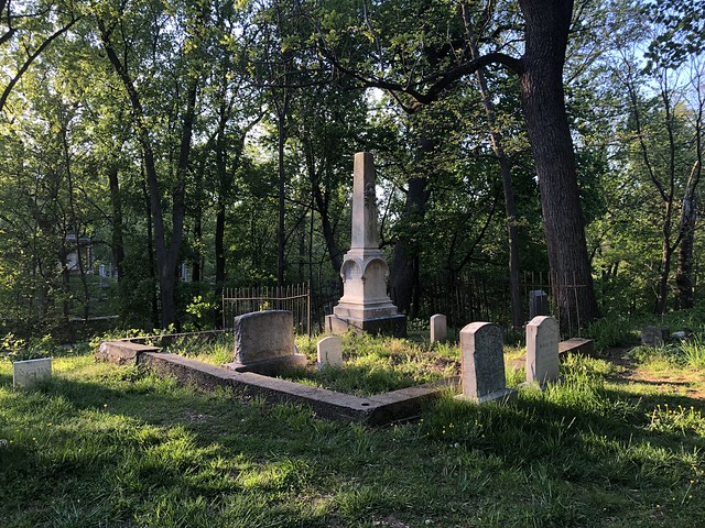 Obelisk and gravestones, evening sunlight at Mount Zion Cemetery, Georgetown, Washington, D.C.