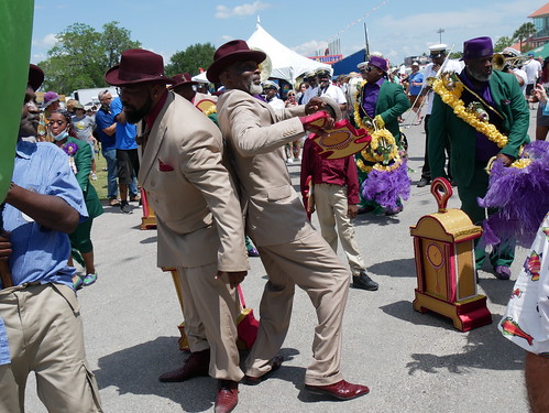 Jazz Funeral for George Wein featuring New Wave Brass Band with We Are One and Keep N It Real Social Aid & Pleasure Clubs on Day 1 of Jazz Fest - April 29, 2022. Photo by Louis Crispino.