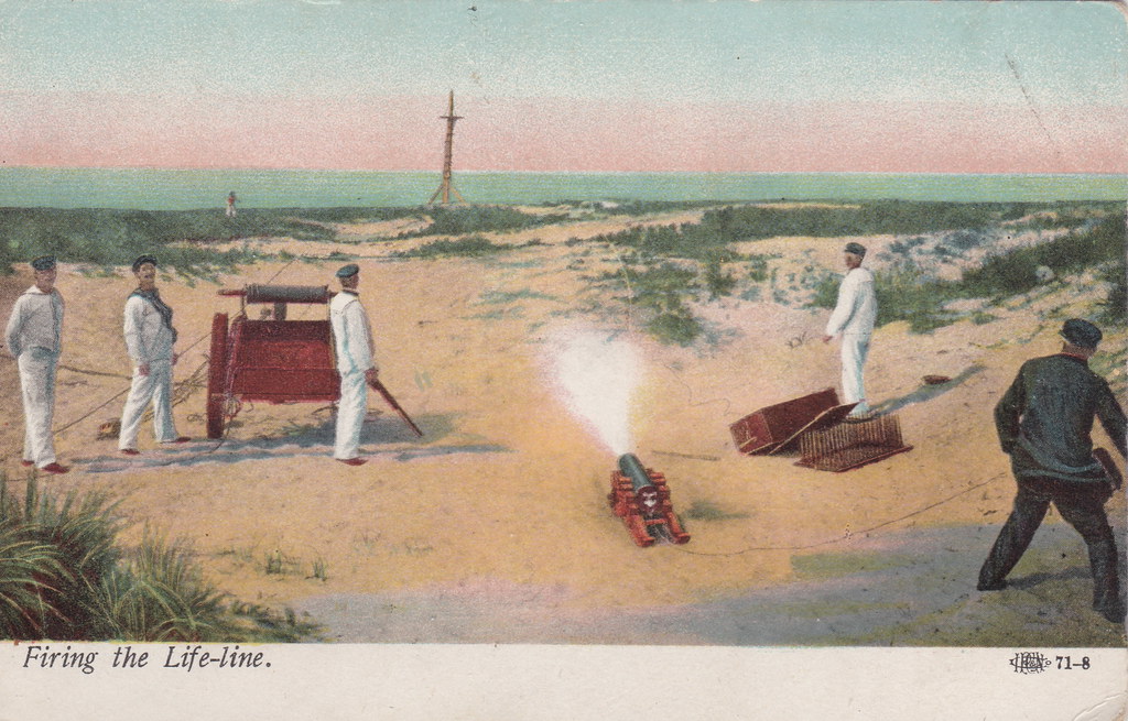 1910 GREAT LAKES REGION USCG USLSS STATION TRAINING the Beach-Apparatus Wagon Drill WITH A LYLE GUN used for a RESCUE by using a Cannon FIRING A LINE to a faux Ship Mast