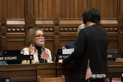 State Rep. Nicole Klarides-Ditria speaks about legislation with Rep. Mastrofrancesco in the House of Representatives.