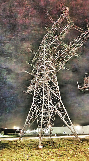 Picture of electric tower in total darkness with smartphone.