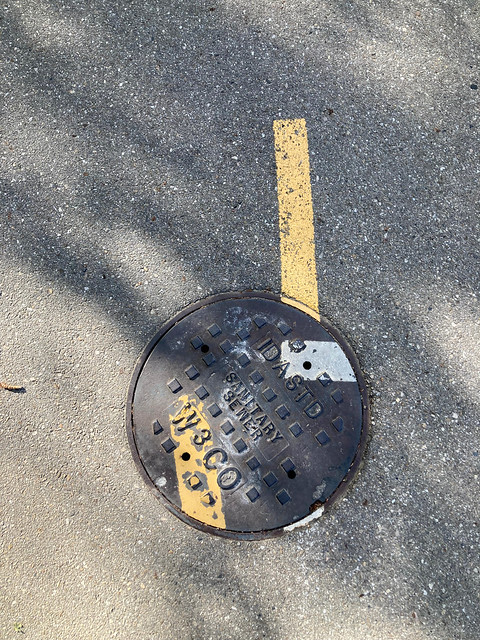 Misaligned Manhole, Yellow