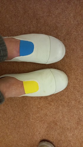 Customised white elastic plimsolls- I slowly removed the white elastics, they were rather loose then, so I added some Ukraine colours | by eurimcoplimsoll