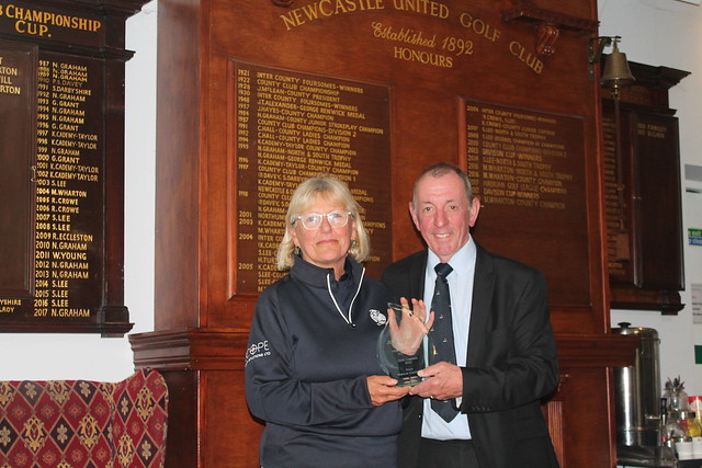 Jen Anderson (Captain Newcastle United Golf Club) receiving a memento frrom Marcus Chisholm (Chairman NDGL) as the first Lady to be a Captain in The Newcastle & District Golf League.