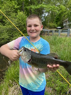 Photo of boy holding a largemouth bass