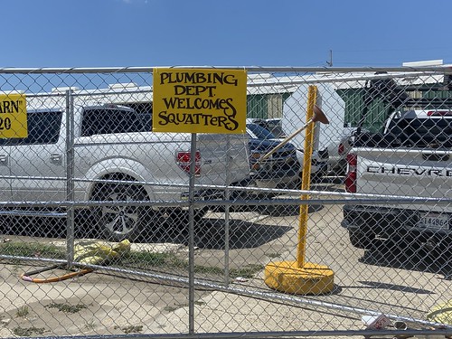 Behind the scenes... Plumbing Department Welcomes Squatters! Jazz Fest 2022. Photo by Carrie Booher