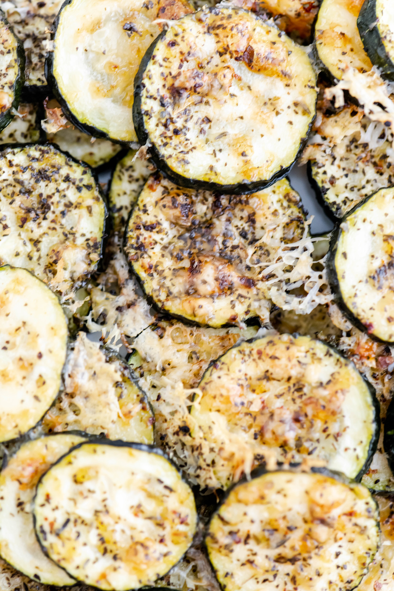 Close up of parmesan zucchini slices.