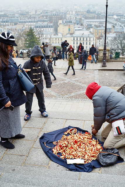 Migrant street sellers, Montmartre, Paris, France