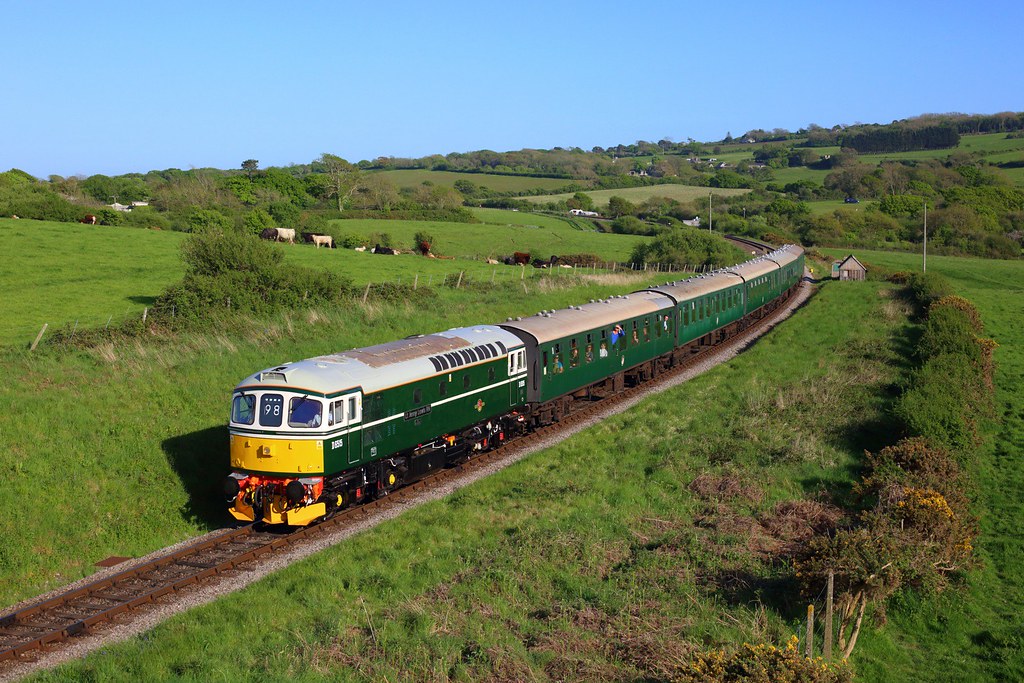 A resplendent looking 33012 powers the 1739 Swanage to Corfe Castle with 46045 taking train to Norden at Valley Road near Corfe on 8 May 2022. Was nice to see Richard, Rowan HJ, David M, Jasper and Jack P here.