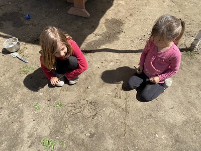drawing with sticks in dirt