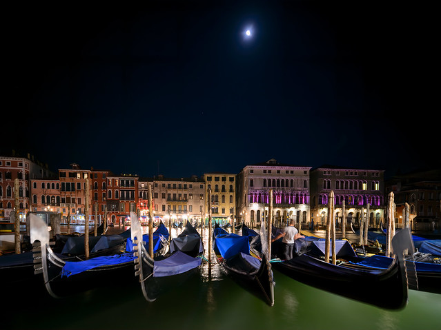 The moon over the Grand Canal at Riva del Vin near the Rialto Bridge, Venice, Italy