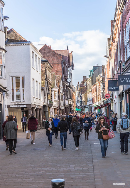 Former capital of England. Winchester High Street on a bright afternoon in early Spring, Hampshire, England.