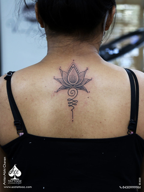 Lotus-and-Unalome-Tattoo-for-Women-529x705