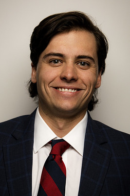Micah Brown portrait in suit and tie