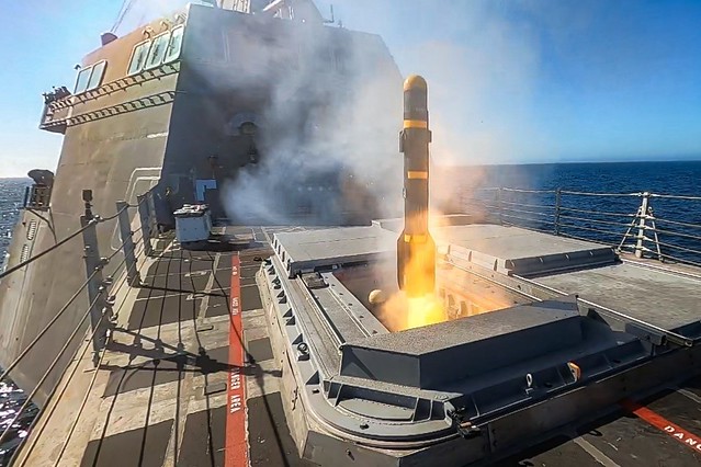 USS Montgomery (LCS 8) launches an AGM-114L Longbow Hellfire missile in the Pacific Ocean.