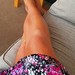 Silky tanned legs and frilly bed shorts.