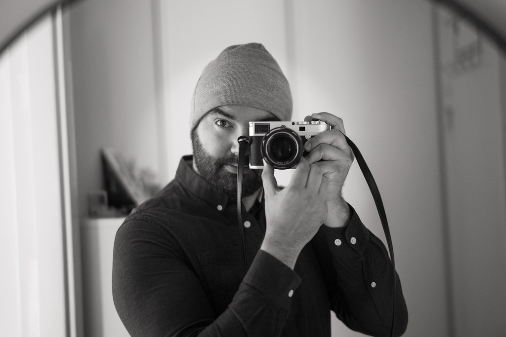 Self portrait in the mirror with Leica camera