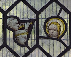 two tonsured heads, one female head  (15th Century)