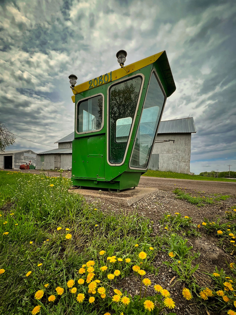 A recycled tractor cab becomes a shelter for school children