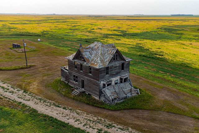 an abandoned little farm on the Prairies