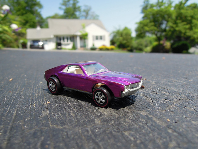 Finally! After years of scrimping and saving, I bought my teen dream car. Proudly parked in the driveway is a fully restored numbers-matching 1969 American Motors AMX. I had it repainted in bright purple and installed four Cragar rims for authenticity.