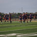 The starting 11 for Corpus Christi FC break a team huddle prior to their 2022 home opener on May 21, 2022 at Saint John Paul II High School in Corpus Christi, Texas 
