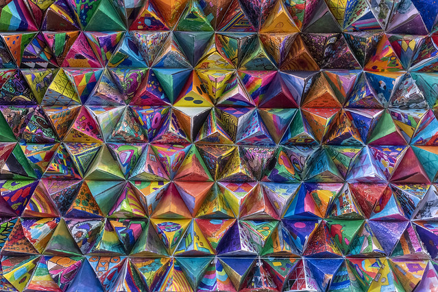 Artwork with colored pyramids