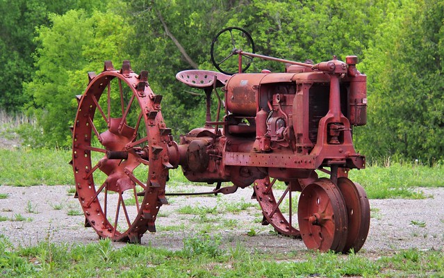 Farm tractor gate guardian, near Blackstock, Township of Scugog, Durham Region, Ontario.