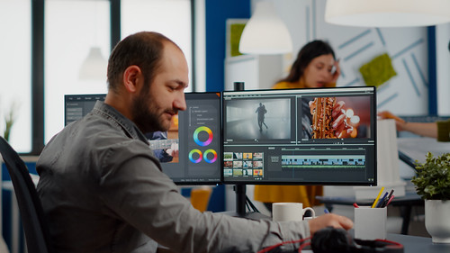 Video maker editing movie using post production software | by iamhalonajackson
