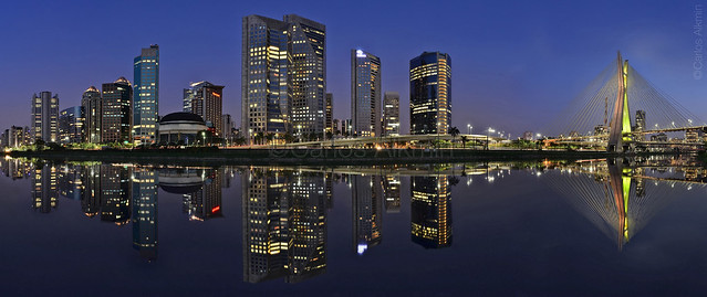 Sao Paulo skyline reflected on Pinheiros River at blue hour