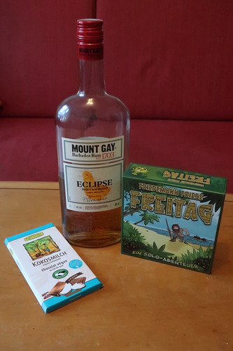 "Mount Gay Rum Eclipse Gold 40%" und Kokosmilchschokolade zum Solokartenspiel "Freitag"