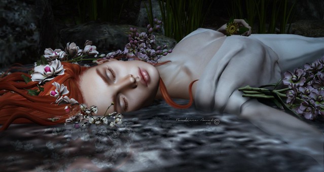 on the calm black water where the stars are sleeping, white Ophelia floats like a great lily