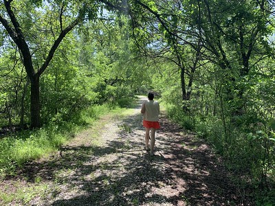 Carrie Walking on a Trail
