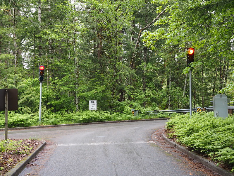 Newhalem Campground Access Road Signals: This one lane bridge by default has its signals set to allow inbound traffic, but uses sensors to switch to allowing outbound traffic.