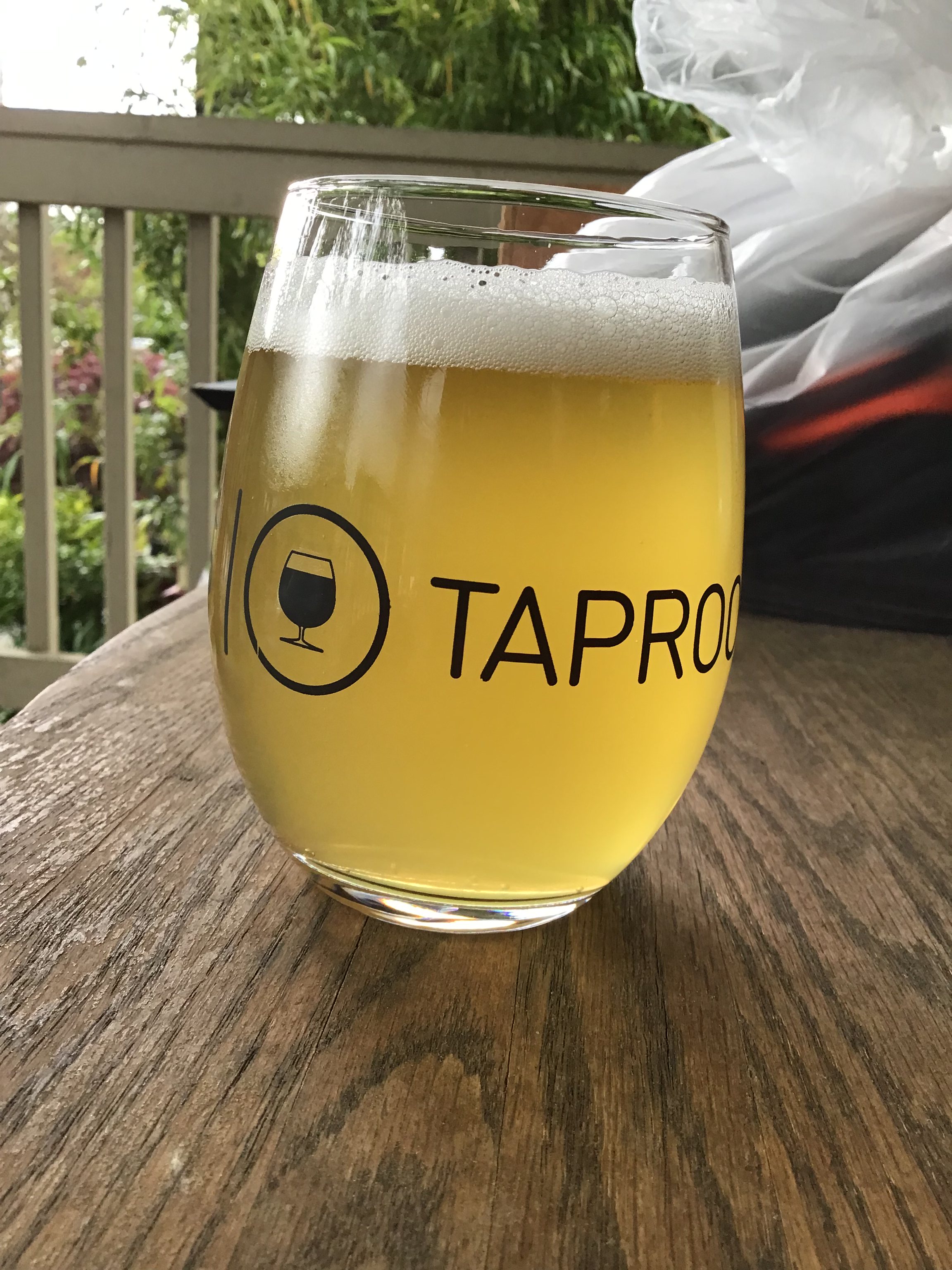 Acid Drop lager  by Black Plague brewing in glass outside