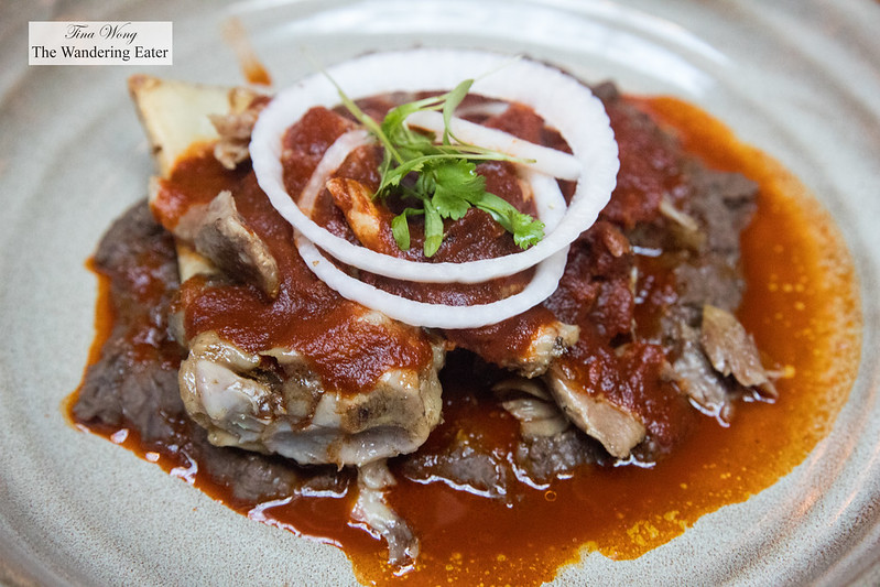 Chamorro en adobo - Slow cooked pork shank, adobo, refried beans