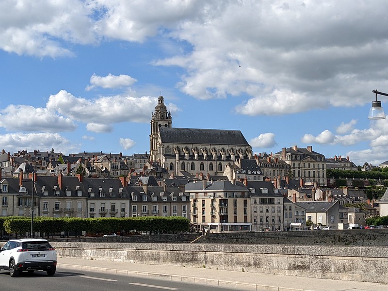 View of the city of Blois with it's cathedral from the middle of the bridge across the Seine.