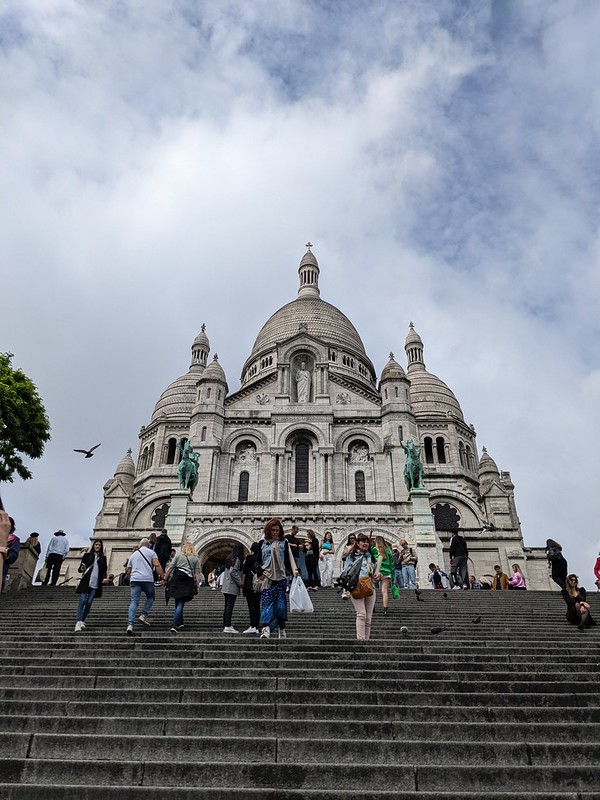 Looking up at the Sacre Coeur from the bottom of the stairs
