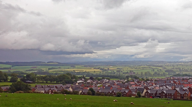 Rain clouds over the Eden Valley and Penrith's new build.